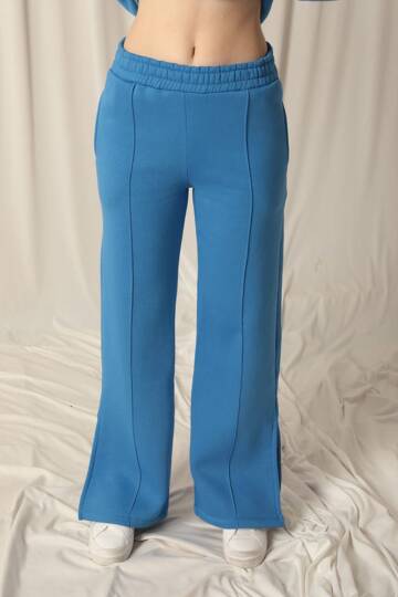 Üç iplik Biyeli Çimalı Yırtmaçlı Bol Paça Kadın Mavi Eşofman - 5